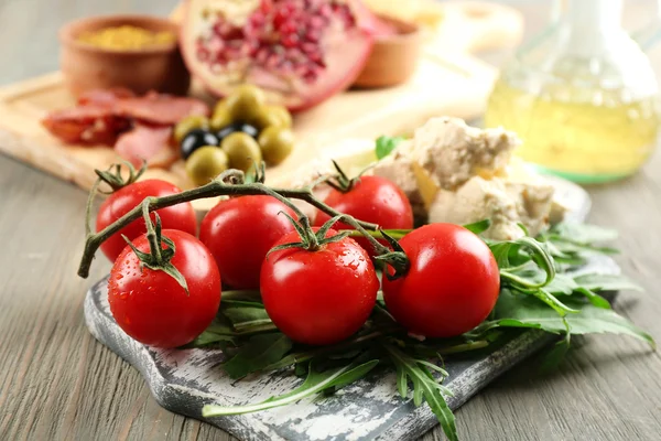 Ingredients of Mediterranean cuisine, on wooden board background — Stock Photo, Image