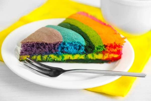 Delicious rainbow cake on plate — Stock Photo, Image