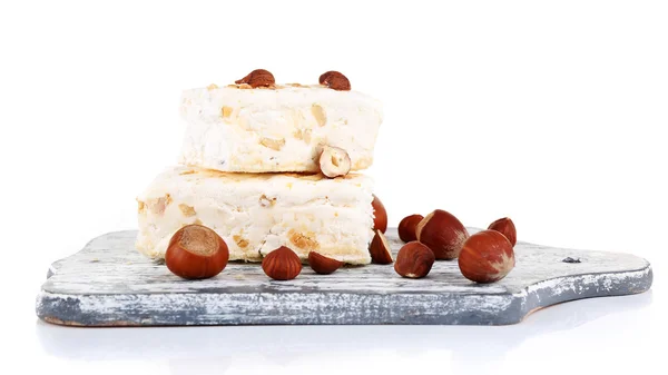 Sweet nougat with hazelnuts — Stock Photo, Image