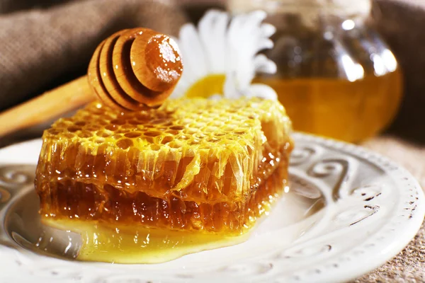 Honey products on plate closeup — Stock Photo, Image