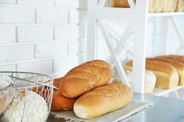 Bread on shelves in store — Stock Photo, Image