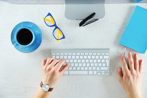 Man working with computer, top view — Stock Photo, Image