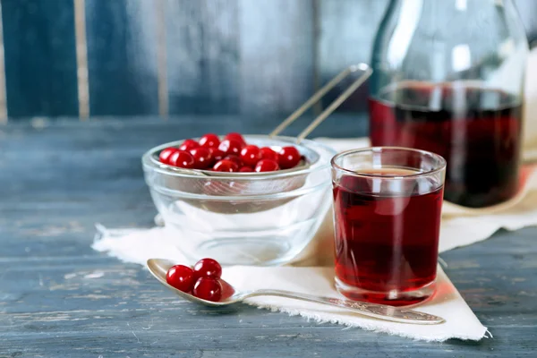 Sweet homemade cherry juice on table — Stock Photo, Image