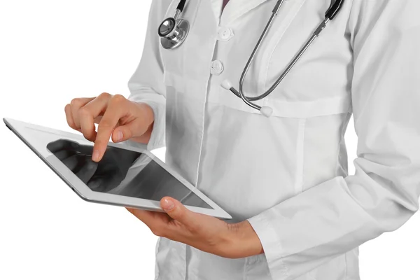 Female doctor working on digital tablet — Stock Photo, Image