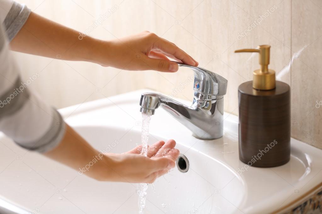 Washing of hands with soap
