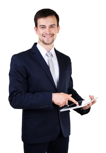 Elegante man in pak met tablet geïsoleerd op wit — Stockfoto