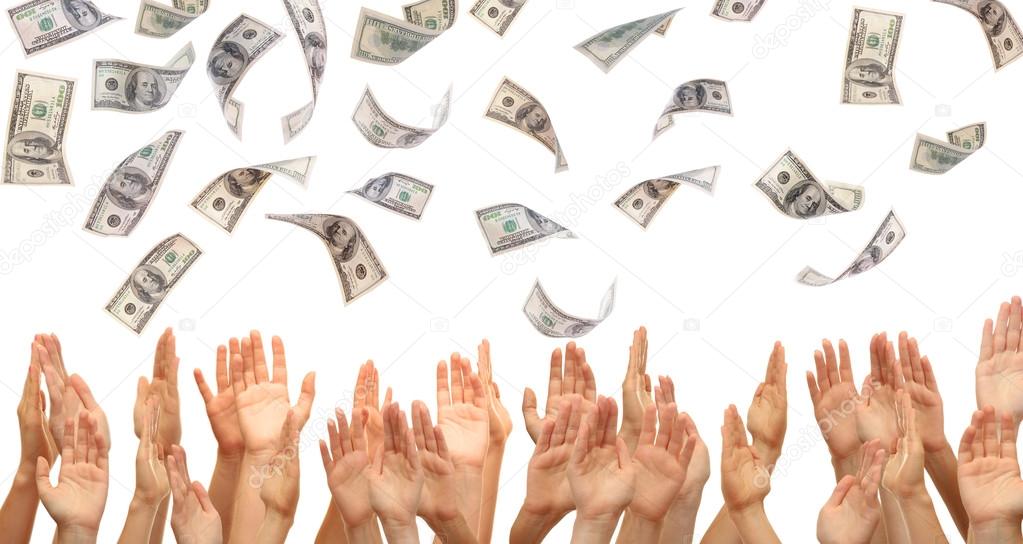 Many hands reaching out for money