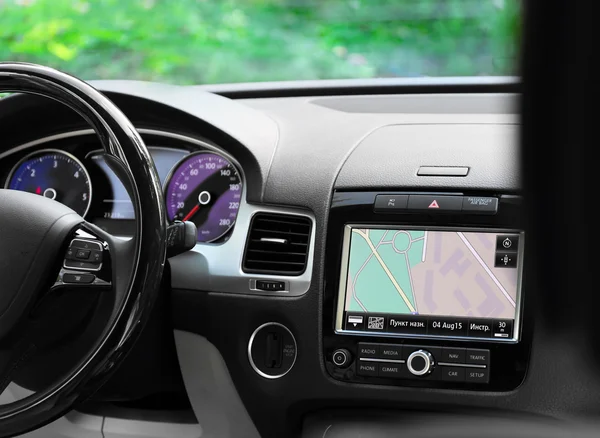 Modern car illuminated dashboard and steering wheel — Stock Photo, Image