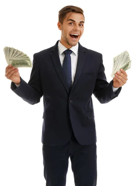 Елегантний чоловік у костюмі тримає гроші ізольовано на білому — стокове фото