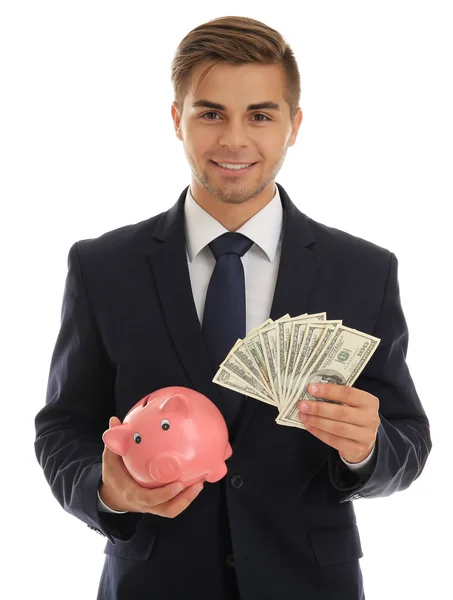 Елегантний чоловік тримає скарбничку з грошима ізольовано на білому — стокове фото