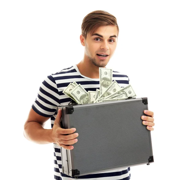 Bonito jovem segurando caso com dinheiro isolado em branco — Fotografia de Stock