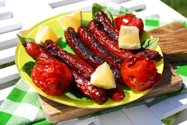 Grilled sausages with vegetables — Stock Photo, Image