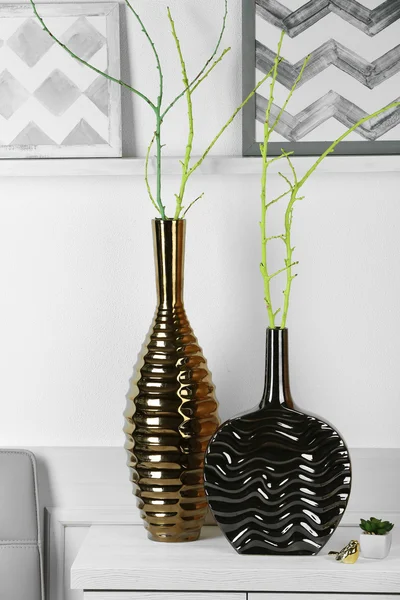 Modern vases on commode — Stock Photo, Image