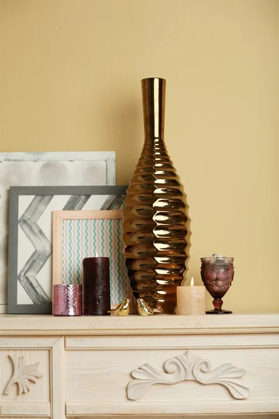 Modern vase with decor on fireplace — Stock Photo, Image