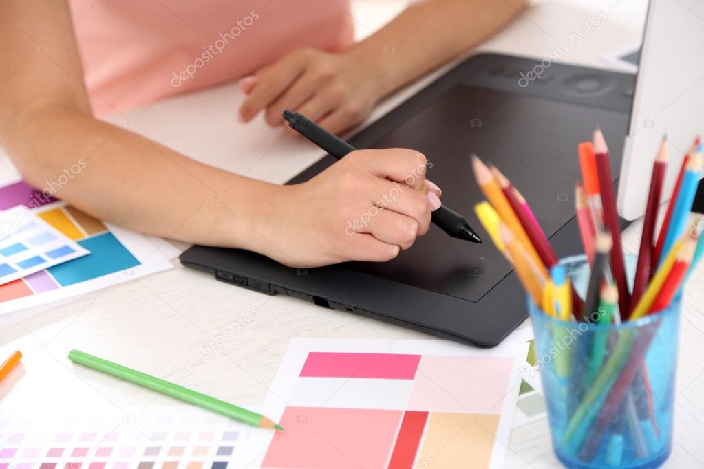 Artist drawing on graphic tablet