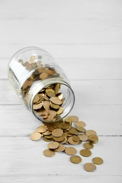 Coins in money jar — Stock Photo, Image