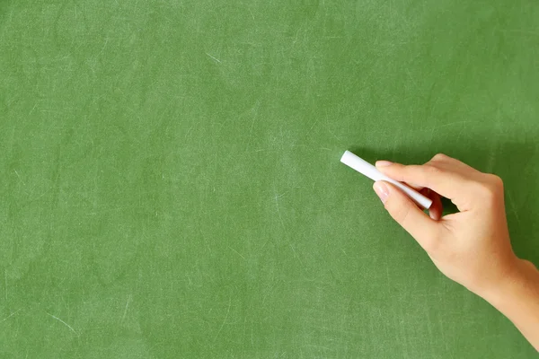 Vrouwelijk handschrift op schoolbord — Stockfoto