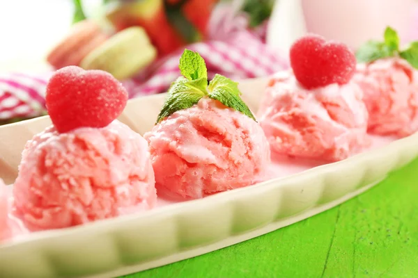 Watermelon ice cream in bowl  on color wooden background — Stock Photo, Image