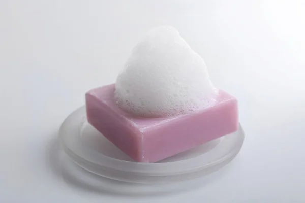 Pieza de jabón con espuma —  Fotos de Stock