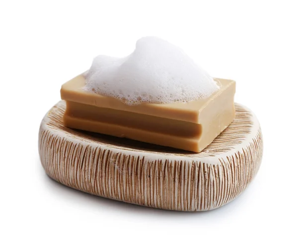 Seife mit Schaumstoff isoliert auf weiß — Stockfoto