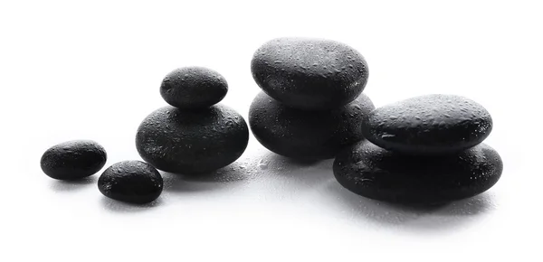 Wet spa stones isolated on white — Stock Photo, Image