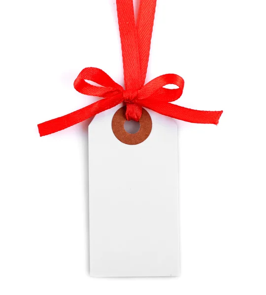 Etichetta regalo vuota con fiocco isolato su bianco — Foto Stock