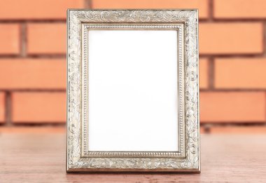 Tuğla duvar arka plan üzerinde fotoğraf çerçevesi