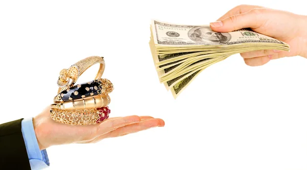 Jewelry and money on hands- pawnshop concept — Stock Photo, Image