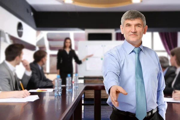 Businessman Giving Hand Handshake Blurred Business People Background — Stock Photo, Image