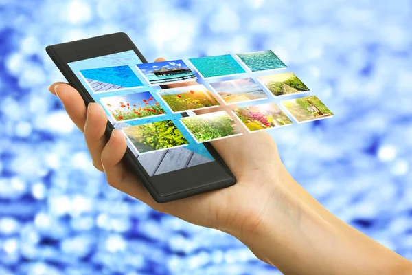 Hand houden smartphone — Stockfoto