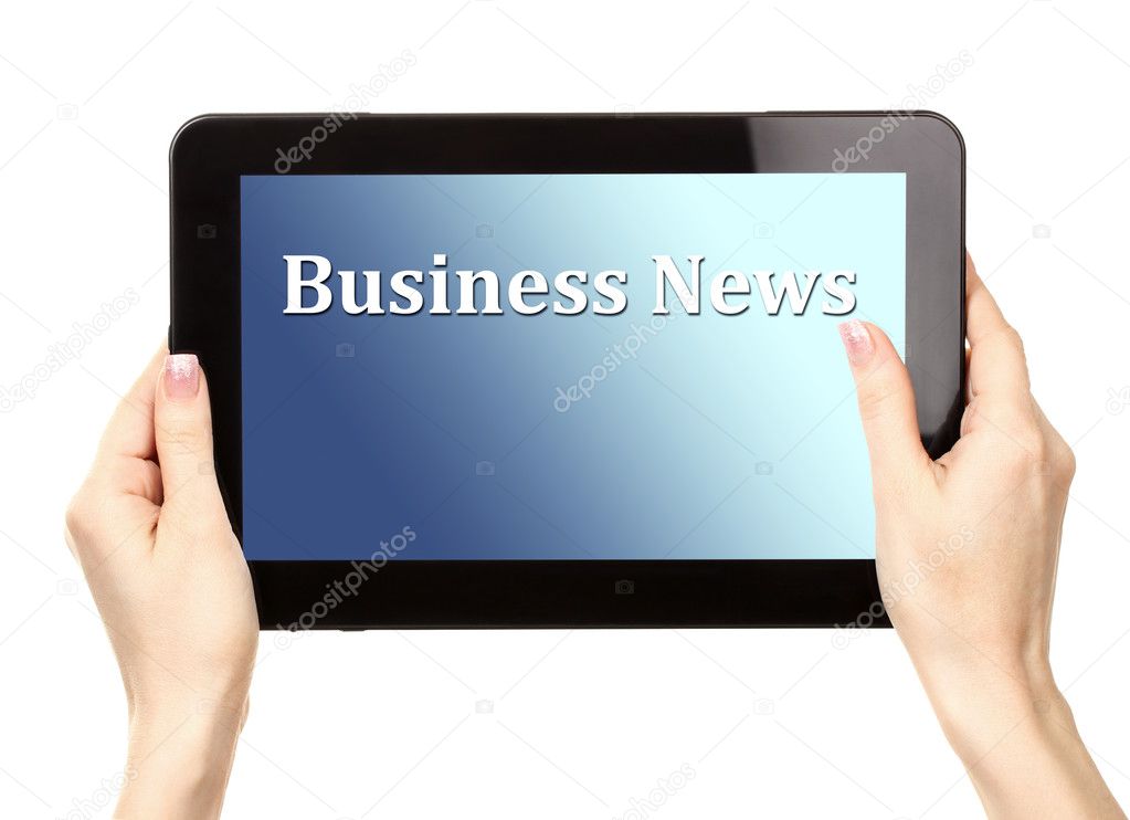 Woman reading  news on tablet PC