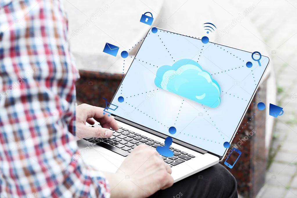 Man working with  cloud computing diagram
