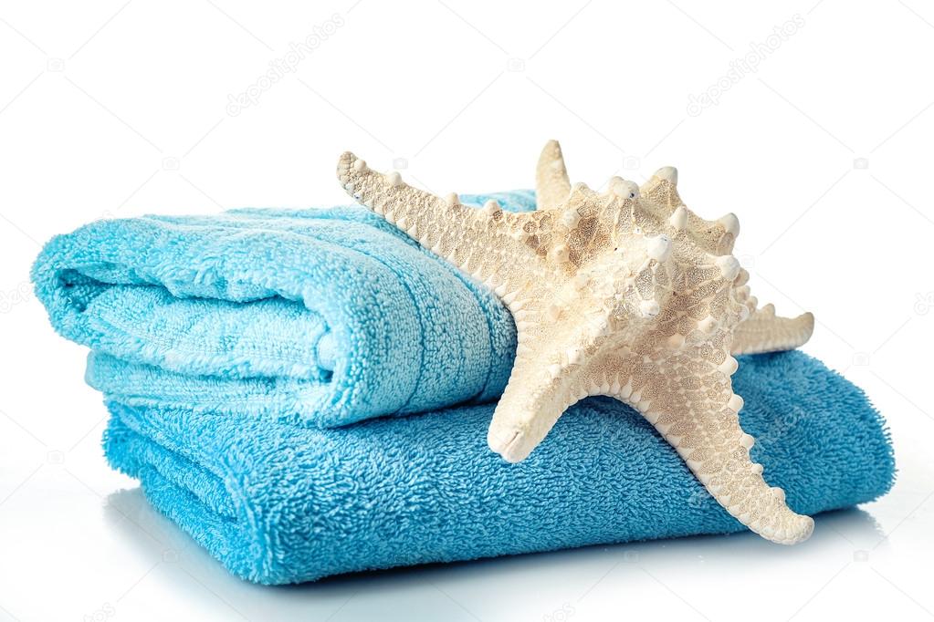 Stack of colorful towels isolated on white