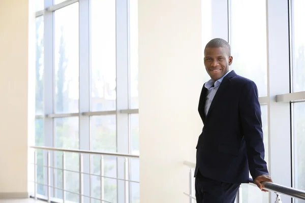 Handsome African American businessman in office — Stock Photo, Image