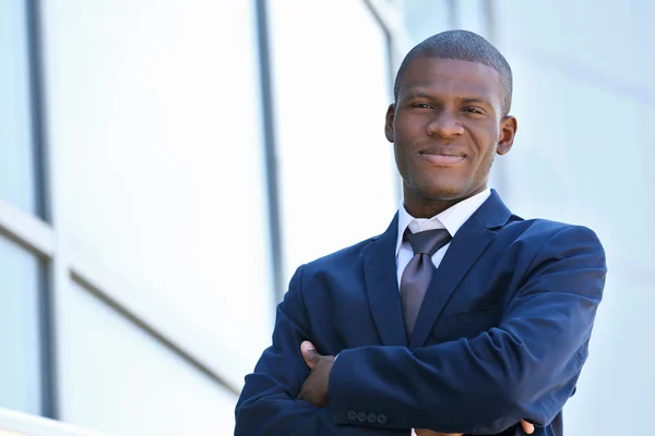 Handsome African American businessman near business centre — Stock Photo, Image