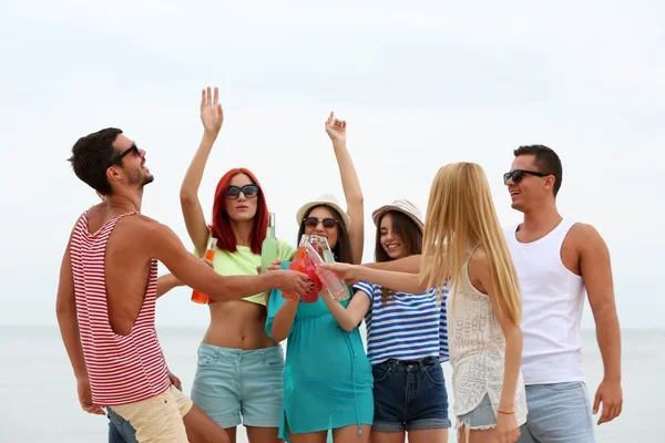 Beautiful people having fun on beach — Stock Photo, Image