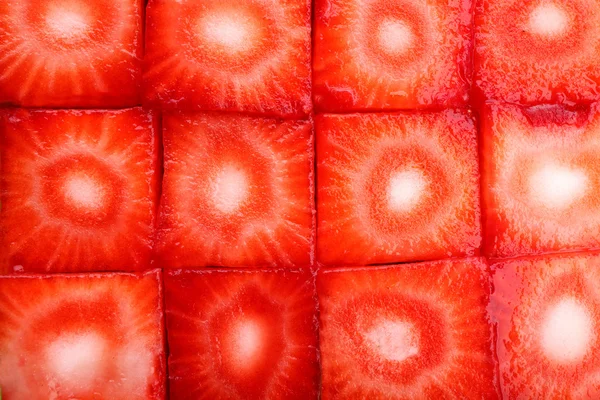 Fresas frescas en rodajas cubos de cerca — Foto de Stock