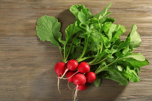 Fresh red radish on wooden background — Stock Photo, Image