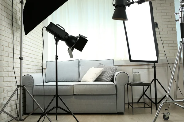 Photo studio with modern interior and lighting equipment — Stock Photo, Image