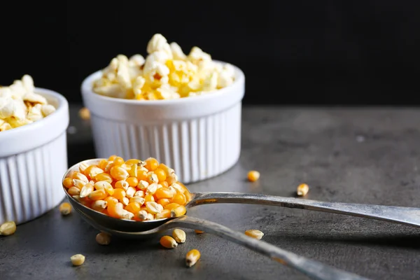 Popcorn in bowls on dark background — Stock Photo, Image