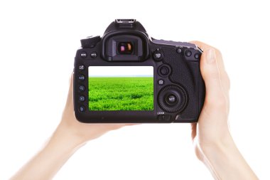Fotoğrafçı ile fotoğraf makinesi üzerinde beyaz izole iş yerinde,