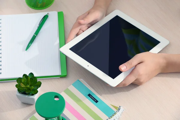 Woman using digital tablet on workplace close up — Stock Photo, Image