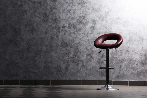 Chair on grey wall background — Stock Photo, Image