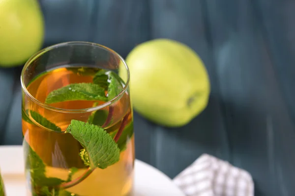 Glass of apple juice with fruits — Stock Photo, Image