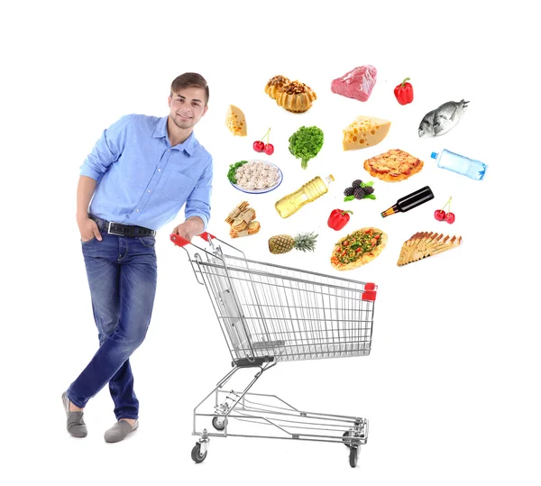 Joven empujando carrito de compras — Foto de Stock