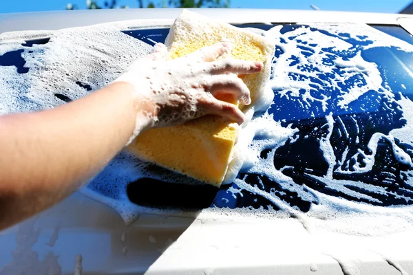 Hand washing car window — Stock Photo, Image