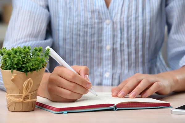Woman write on notebook — Stock Photo, Image