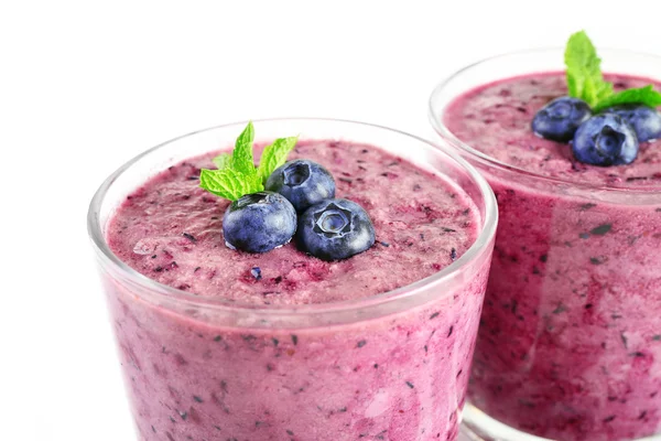 Glass of blueberry smoothie isolated on white — Stock Photo, Image