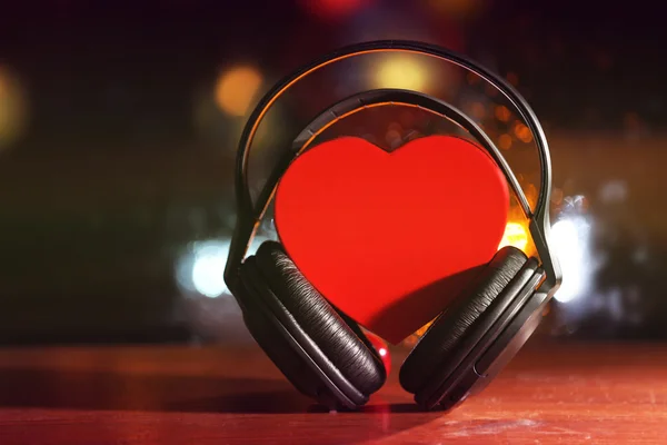 Decorative heart and headphones — Stock Photo, Image