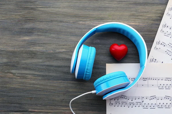 Earphones with red heart a — Stock Photo, Image